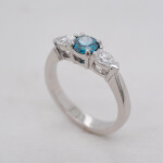 Blue White Diamond Three Stone Ring Angle 1080x1080