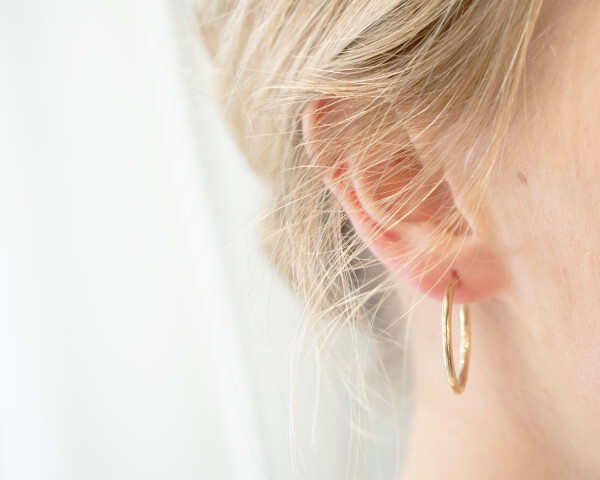 Medium Hoop Earrings Yellow Gold On Ear 1080x1350