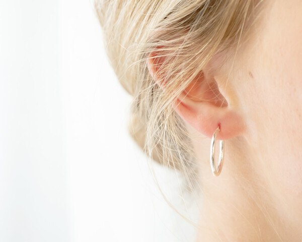 Medium Hoop Earrings Silver On Ear 1080x1350